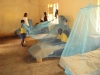 Students at Lulundi Special Primary School learn how to use bednets properly.