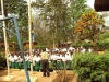 The Headmaster of Ndwika Girls Secondary boarding school addresses the students to instruct them on the proper hanging and use of bednets.