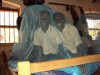 Hanging nets is fun with a friend at Lukuledi Special Primary School.