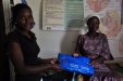 After an ante-natal check up at the TSMP clinic, this expectant mother receives her net.