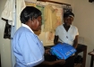 The first of six expectant mothers in today's clinic receiving a bed net.