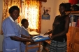 The third of six expectant mothers in today's clinic receiving a bed net.