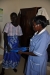 An expectant mother at the TSMP clinic receiving a bed net.
