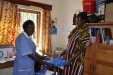 An expectant mother at the TSMP clinic receiving a bed net.