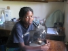 Lab tech Alupo Helen screens for malaria
