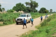 Children race our CSO trainers to their village.