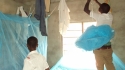 Tumaini: At Tumaini School, the students work hard to install their nets.