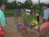 Follow-up: Villagers helping plant the commemorative tree.